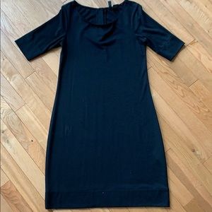 Simple black dress with buttons on the back